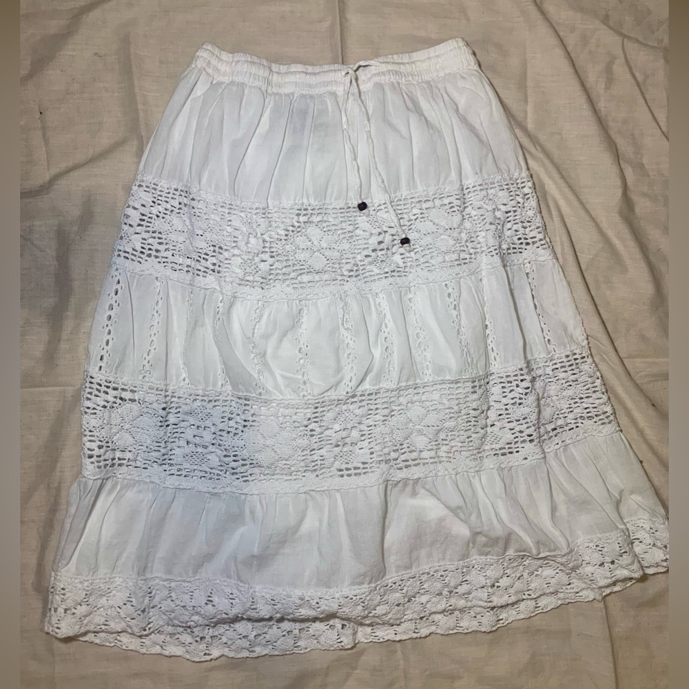 A white midi skirt with cute flower designs- size- medium